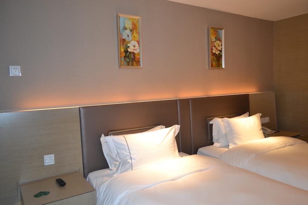 Angel Garden Hotel Hohhot Quarto foto